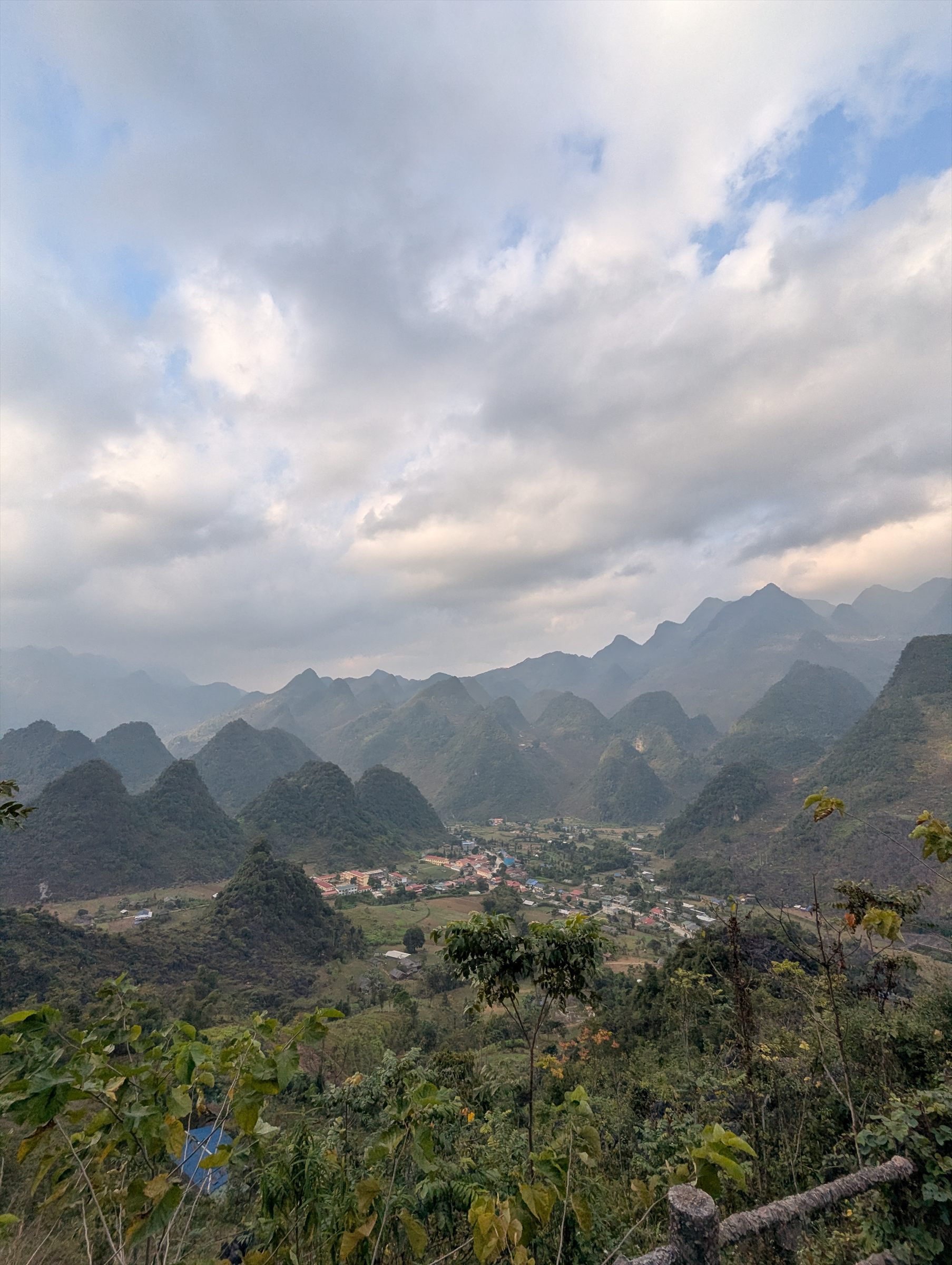 Limestone peaks above a valley town